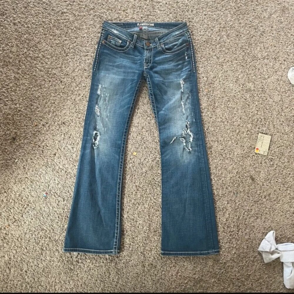 distressed low rise jeans